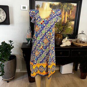 vintage polynesian dress multi color w/lg. front pocket on right side cap sleeve